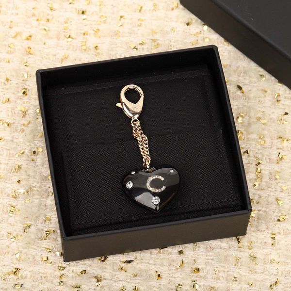 2022 luxury quality charm pendant key chain with diamond and black color have box stamp ps3463a, Golden
2022 luxury quality charm pendant key chain with diamond and black color have box stamp ps3463a, Golden