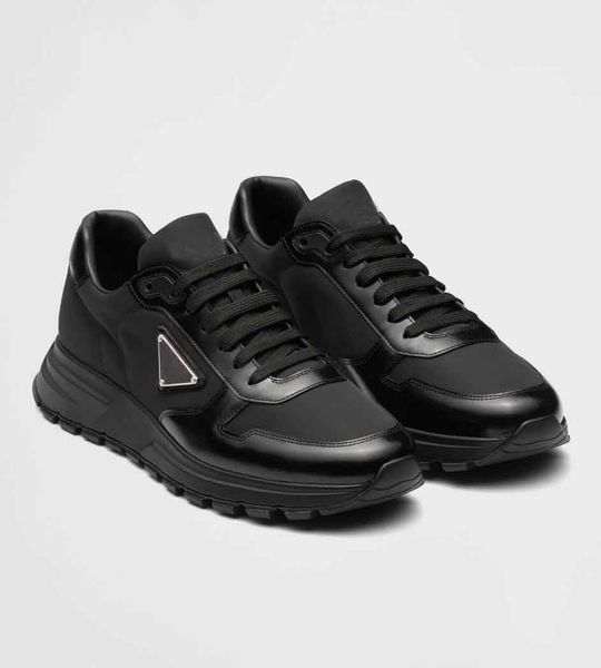 famous embossed triangle sneakers shoes men patent leather technical fabric prax 01 runner sports man flexible rubber sole eu38-46
famous embossed triangle sneakers shoes men patent leather technical fabric prax 01 runner sports man flexible rubber sole eu38-46