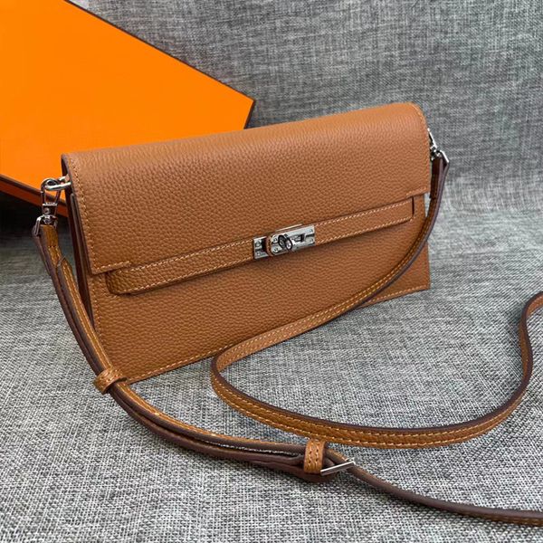 5a designer women bag cross body bags purse with strap togo woman wallets silver gold buckle whole cowskin card holders bags fashion genuine
5a designer women bag cross body bags purse with strap togo woman wallets silver gold buckle whole cowskin card holders bags fashion genuine