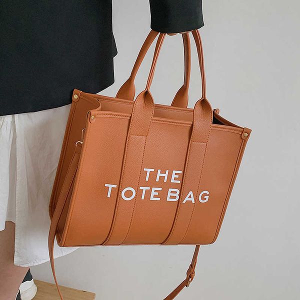 designer bags tote marc's jacob leather luxury handbag women's new solid color letter printing shoulder large capacity casual mess
designer bags tote marc's jacob leather luxury handbag women's new solid color letter printing shoulder large capacity casual mess