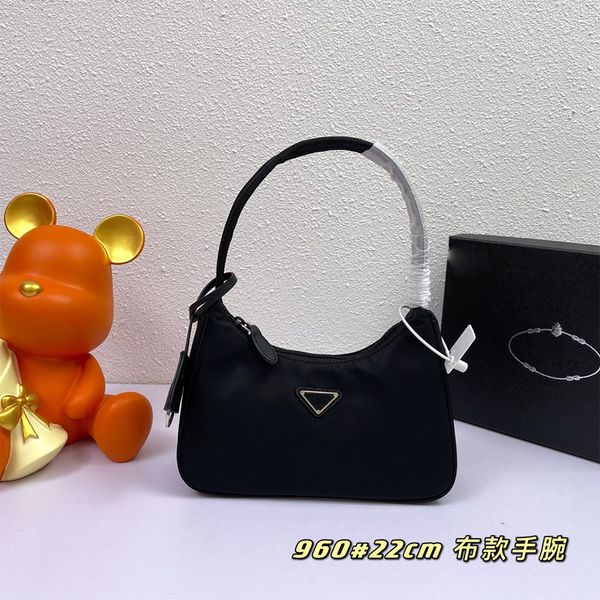 handbag underarm shoulder bag luxury designer bag nylon tote bag mini alphabet logo chain switch wallet vintage women's tote purse 22x1
handbag underarm shoulder bag luxury designer bag nylon tote bag mini alphabet logo chain switch wallet vintage women's tote purse 22x1