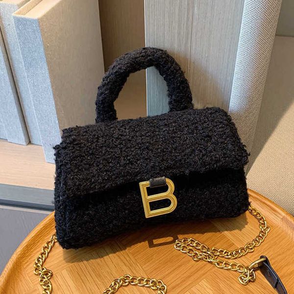 messenger bags s autumn and winter women 2022 new women's hourglass premium hand held wool bag
messenger bags s autumn and winter women 2022 new women's hourglass premium hand held wool bag