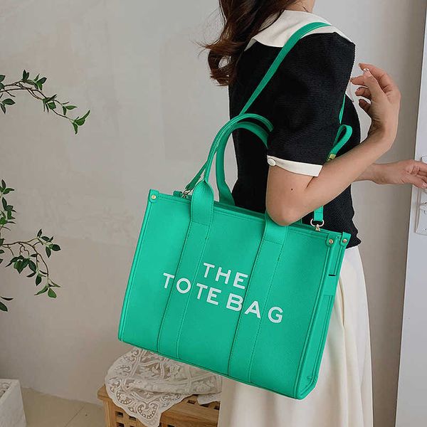 designer bags tote marc's jacob leather luxury handbag women's new solid color letter printing shoulder large capacity casual mess
designer bags tote marc's jacob leather luxury handbag women's new solid color letter printing shoulder large capacity casual mess