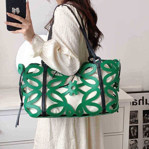 evening bags women's new summer 2022 large capacity bags cutout tote fashion texture shoulder lady simple underarm bolsas femini 220623
evening bags women's new summer 2022 large capacity bags cutout tote fashion texture shoulder lady simple underarm bolsas femini 220623