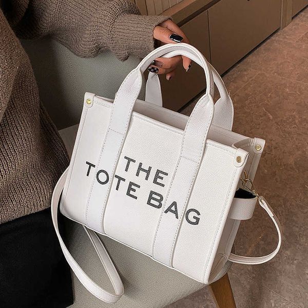 designer bags tote marc's jacob leather luxury handbag new simple fashionable diagonal literary style letter printed large single shoul
designer bags tote marc's jacob leather luxury handbag new simple fashionable diagonal literary style letter printed large single shoul