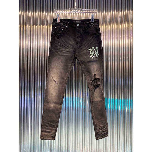 new wash water old black letter print knee hole slim fit jeans men's fashion amirly, Blue
new wash water old black letter print knee hole slim fit jeans men's fashion amirly, Blue