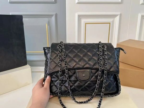 Designer designed large capacity black dia grid flip zipper design for a shoulder bag and crossbody bag.
Designer designed large capacity black dia grid flip zipper design for a shoulder bag and crossbody bag.