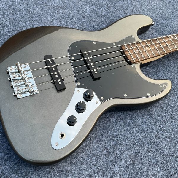 Metallic Gray Offset Bass: Sleek Design, Black Pickguard & Dual Black Pickups
Metallic Gray Offset Bass: Sleek Design, Black Pickguard & Dual Black Pickups