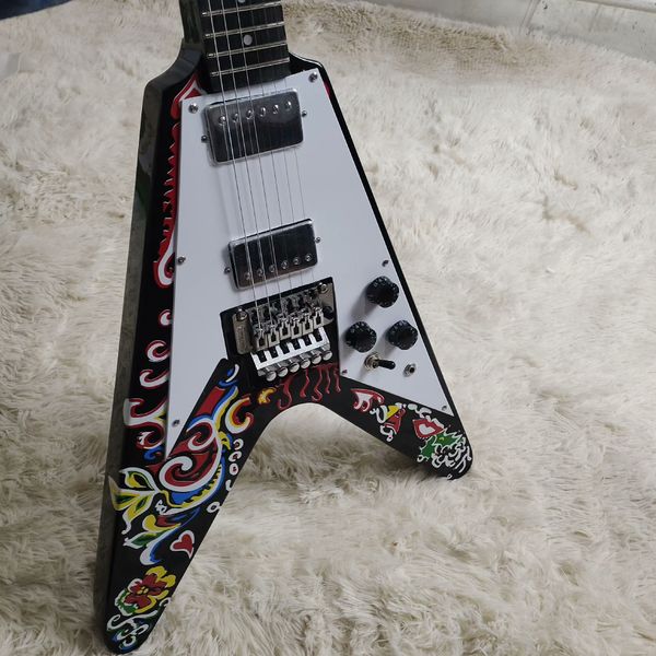 Bold Angular V-Shape Electric Guitar: Black Body, Colorful Art Patterns & White Pickguard
Bold Angular V-Shape Electric Guitar: Black Body, Colorful Art Patterns & White Pickguard