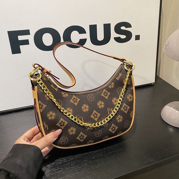 Free shipping 2025 new designer bag fashionable commuting tote premium texture printed single shoulder diagonal cross armpit bag, Gold
Free shipping 2025 new designer bag fashionable commuting tote premium texture printed single shoulder diagonal cross armpit bag, Gold