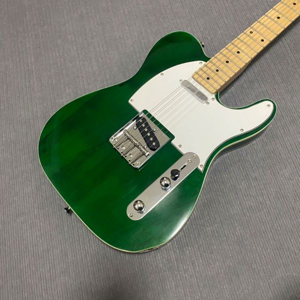 Vibrant Glossy Green Single-Cut Guitar: White Pickguard, Metallic Bridge & Maple Neck
Vibrant Glossy Green Single-Cut Guitar: White Pickguard, Metallic Bridge & Maple Neck