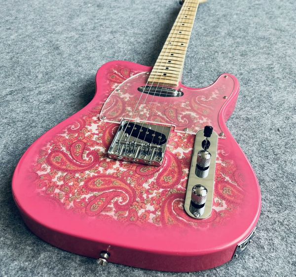 Bold Pink Paisley Electric Guitar: Intricate Pattern, Clear Pickguard, Metallic Hardware, Maple Neck
Bold Pink Paisley Electric Guitar: Intricate Pattern, Clear Pickguard, Metallic Hardware, Maple Neck