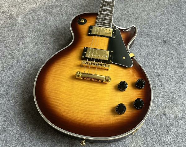 Brown-Yellow Sunburst Guitar: Wood Grain Gloss, Gold Hardware & Rock Precision
Brown-Yellow Sunburst Guitar: Wood Grain Gloss, Gold Hardware & Rock Precision
