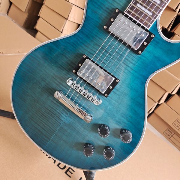 Striking Glossy Blue Gradient Single-Cut Guitar w/ Wood Grain, Black Pickguard & Metallic Humbuckers
Striking Glossy Blue Gradient Single-Cut Guitar w/ Wood Grain, Black Pickguard & Metallic Humbuckers