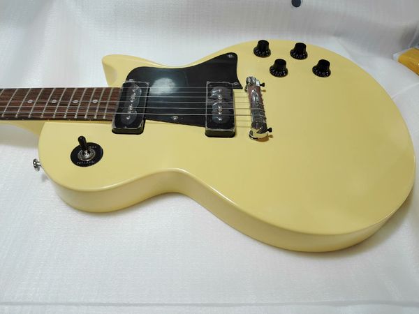 Sleek Cream Gloss Single-Cut Electric Guitar: Black Pickguard, Dual Humbuckers, Tune-O-Matic Bridge
Sleek Cream Gloss Single-Cut Electric Guitar: Black Pickguard, Dual Humbuckers, Tune-O-Matic Bridge