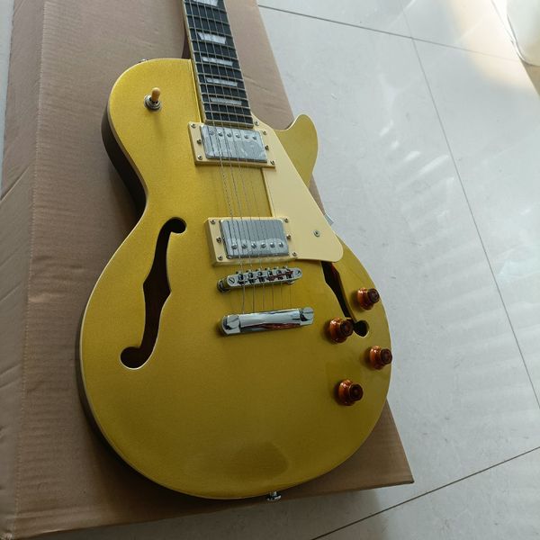 Glossy Golden Semi-Hollow Electric Guitar: F-Holes, Cream Pickguard, Metal-Frame Humbuckers
Glossy Golden Semi-Hollow Electric Guitar: F-Holes, Cream Pickguard, Metal-Frame Humbuckers