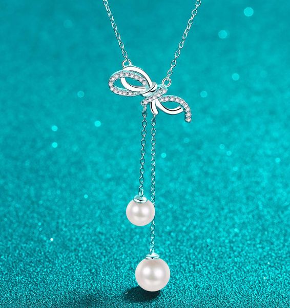 925 Sterling Silver Moissanite Bow Necklace with Natural Freshwater Pearls Tassel Pendant Elegant Minimalist Clavicle Chain
925 Sterling Silver Moissanite Bow Necklace with Natural Freshwater Pearls Tassel Pendant Elegant Minimalist Clavicle Chain
