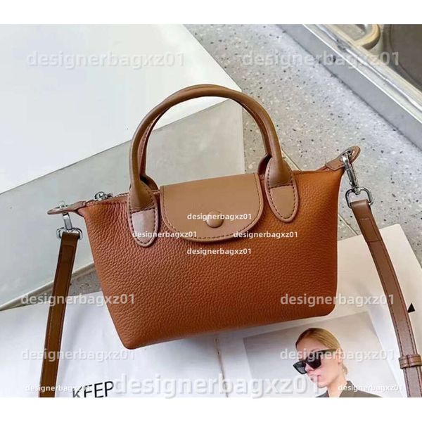 Mini Tote French Beach Bag Designer L O N G C H A M P Dumpling Bags Mini Litchi Texture Versatile Shoulder Crossbody Handbag Women Makeup Saddle Denim Bag, Socks (contact seller;confirm style)
Mini Tote French Beach Bag Designer L O N G C H A M P Dumpling Bags Mini Litchi Texture Versatile Shoulder Crossbody Handbag Women Makeup Saddle Denim Bag, Socks (contact seller;confirm style)