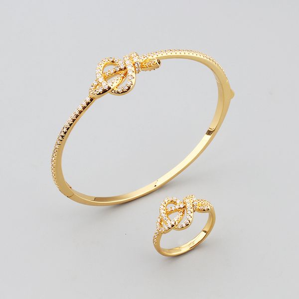 Simple Creative Knot Bow Bracelet Ring Set Elegant Unisex Copper Gold-Plated Micro-Inlaid Zircon Jewelry
Simple Creative Knot Bow Bracelet Ring Set Elegant Unisex Copper Gold-Plated Micro-Inlaid Zircon Jewelry