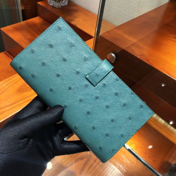 99A This 17.5cm handbag wallet is designed by a top designer. It exudes a relaxed and fashionable vibe. It is made of imported ostrich leather and is custom-made by hand., One
99A This 17.5cm handbag wallet is designed by a top designer. It exudes a relaxed and fashionable vibe. It is made of imported ostrich leather and is custom-made by hand., One