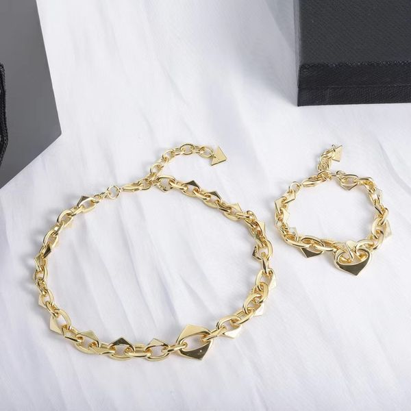 Luxury Designer Necklace Bracelet Set Triangle Pendant, 18K Gold Plated Stainless Steel, Couple Letter Choker Chain, Wedding Jewelry Gift for Women Men, Golden
Luxury Designer Necklace Bracelet Set Triangle Pendant, 18K Gold Plated Stainless Steel, Couple Letter Choker Chain, Wedding Jewelry Gift for Women Men, Golden
