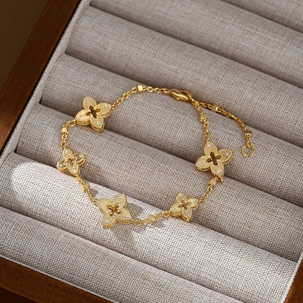 chic hollow clover bracelet golden hollow flower motifs with crystals delicate chain stylish womens jewelry
chic hollow clover bracelet golden hollow flower motifs with crystals delicate chain stylish womens jewelry