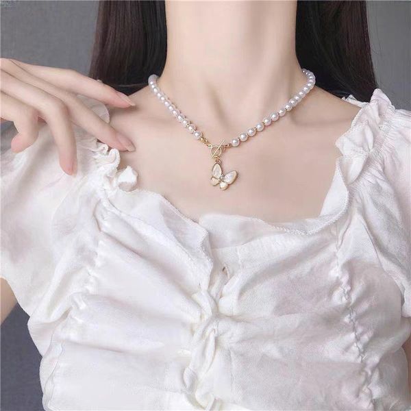 Bow Tie Pearl Necklace Designer For Women OT Buckle Bow Pendant Necklaces Luxury Round Pearls Chain Necklaces Hip Hop Jewelry Girls Gifts Bijoux Luxe
Bow Tie Pearl Necklace Designer For Women OT Buckle Bow Pendant Necklaces Luxury Round Pearls Chain Necklaces Hip Hop Jewelry Girls Gifts Bijoux Luxe