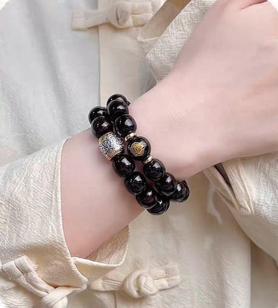 Golden Buddha statue Bracelet Designer for Women Men Jewelry Obsidian Bodhi Root Buddha beads Double Loop Charm Bracelet bijux Luxe Gift 10-12MM
Golden Buddha statue Bracelet Designer for Women Men Jewelry Obsidian Bodhi Root Buddha beads Double Loop Charm Bracelet bijux Luxe Gift 10-12MM