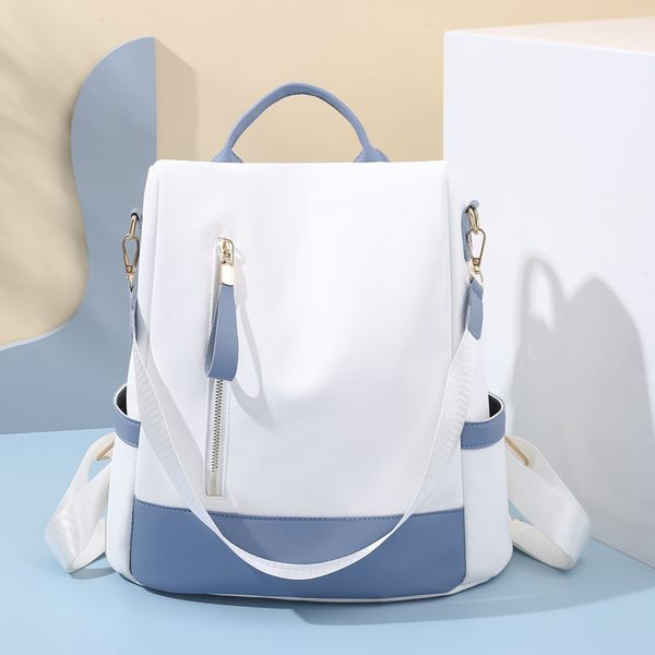 Anti theft backpack dual color versatile women's backpack large capacity college student bag fashionable travel bag for outings