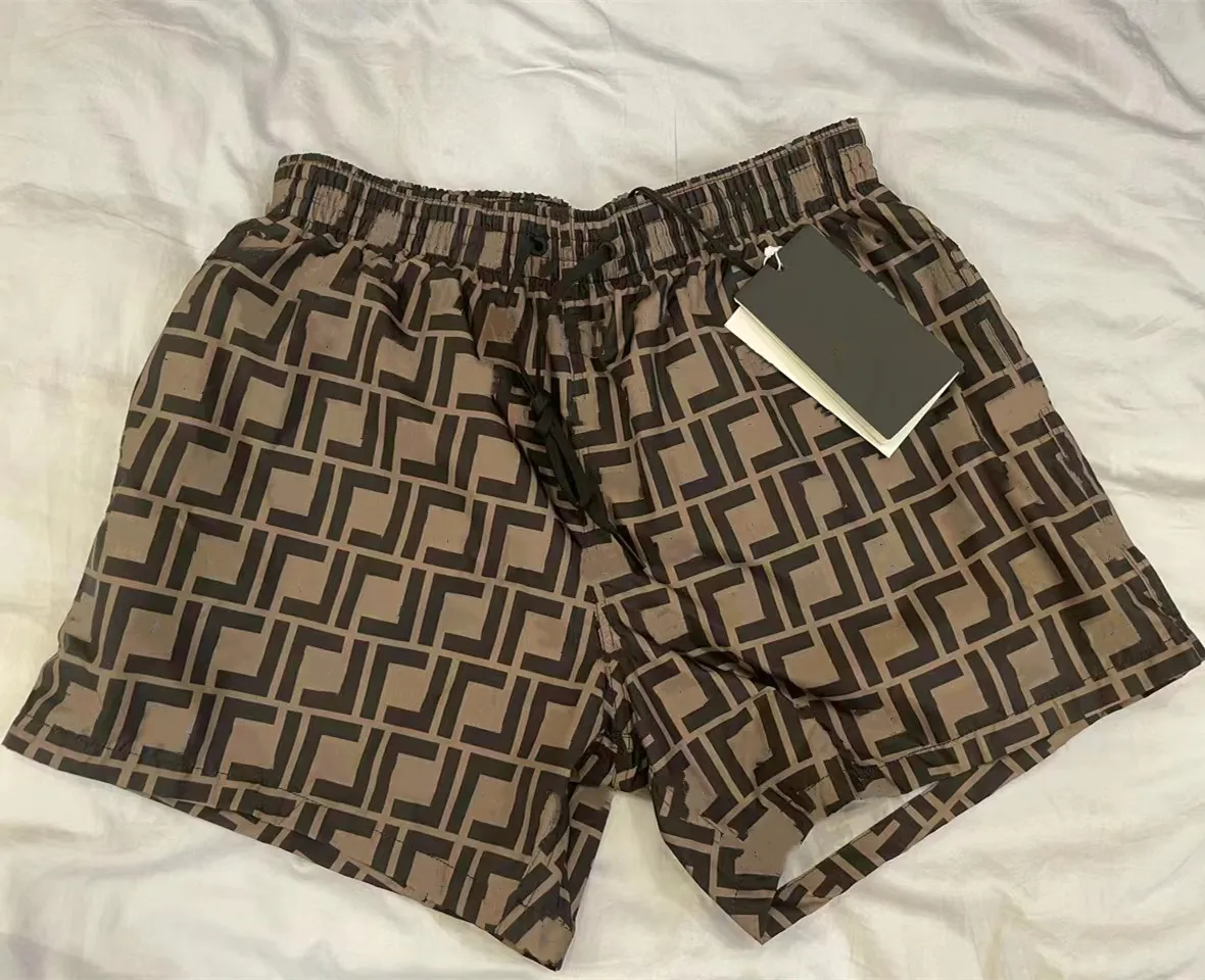 men drawstring shorts quick dry short pant athletic workout gym, White;black
men drawstring shorts quick dry short pant athletic workout gym, White;black