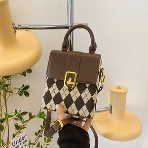 Un bolso de diseñador de nicho para mujeres en otoño e invierno Celebridad de Internet Transmisión en vivo Bolso cruzado diagonal de un solo hombro Teléfono móvil Versátil