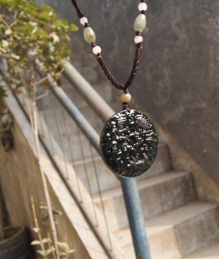 Natural dark green jade. Amulet pendant.Round money (Long) .2012 Year of the Dragon