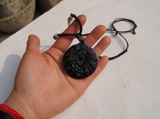 Natural dark green jade. Amulet pendant.Round money (Long) .2012 Year of the Dragon