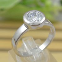Bezel set engagement rings uk