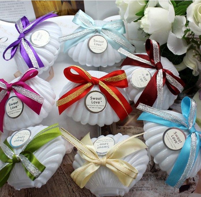 http://www.dhresource.com/albu_327433224_00-1.0x0/2013-new-candy-colors-shell-candy-boxes-wedding.jpg