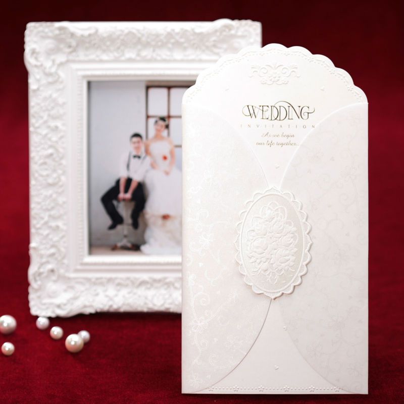 Vintage embossed wedding invitations