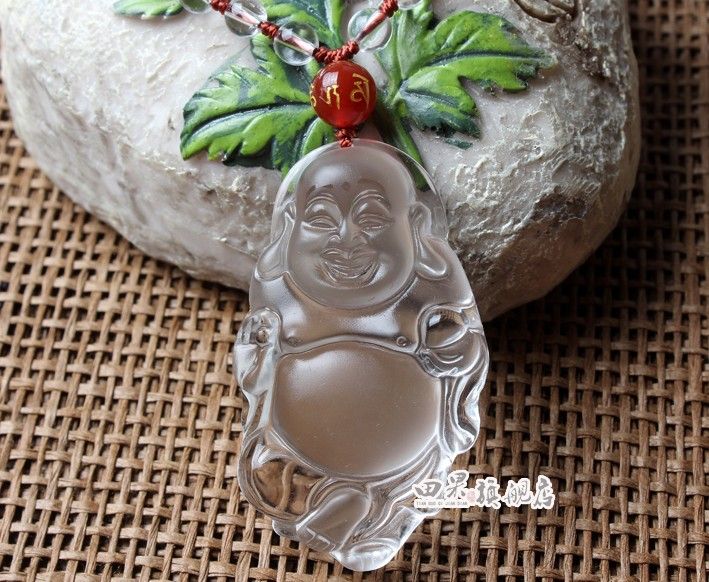 And nephrite, jade Buddha pendant. Sakyamuni, carved clear l0030