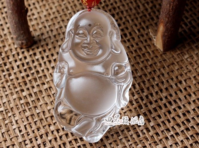 And nephrite, jade Buddha pendant. Sakyamuni, carved clear l0030