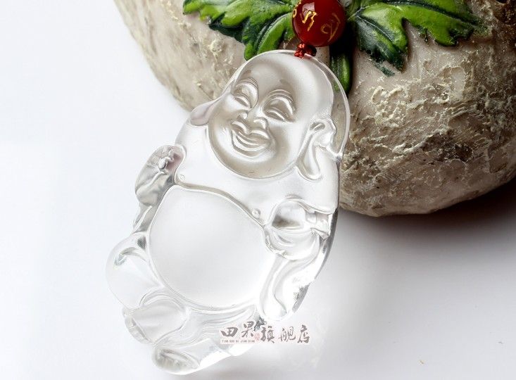 And nephrite, jade Buddha pendant. Sakyamuni, carved clear l0030