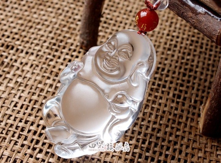 And nephrite, jade Buddha pendant. Sakyamuni, carved clear l0030