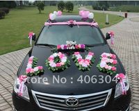 Strung wedding car flowers