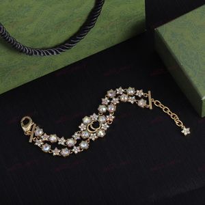 Bracelet à double chaîne en forme de fleur de cristal Alphabet, bracelet de créateur en laiton, bijoux de luxe, pour envoyer des amis amoureux de la famille ou leurs propres meilleurs cadeaux
