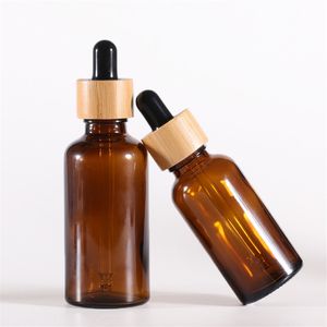 Frasco cuentagotas de vidrio ámbar con tapas de bambú Botellas de aceites esenciales Viales de muestra para líquidos cosméticos de perfume 15ml 20ml 30ml 50ml 100ml