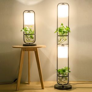 Lámpara de pie de hierro forjado creativa americana simple moderna sala de estar estudio dormitorio planta decoración hidropónica lámpara de mesa