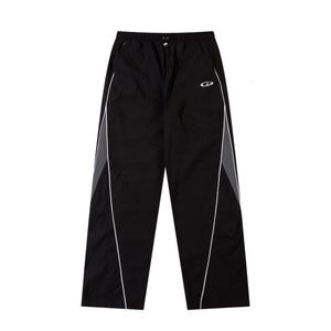 American Street Hip-Hop Loose Corée Patchwork Pantalon de jambe droite avec un style décontracté neutre et un pantalon à jambe large polyvalente avec une sensation tombante