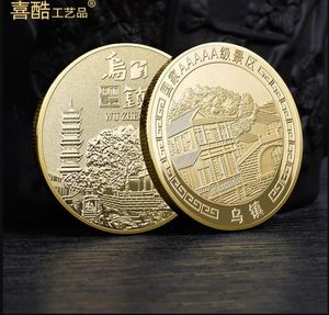 Artes y artesanías Zhejiang Wuzhen Pescado y arroz Ciudad natal Moneda de oro y plata Medalla conmemorativa de turismo del área escénica especial de nivel nacional 5A