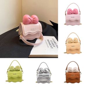 Automne nouvelle édition coréenne Mini enfants filles sac à bandoulière Bow chaîne bandoulière petit sac Parent enfant sac femmes sac 230915