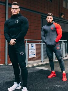 Automne survêtement salle de Sport en cours d'exécution hommes ensemble vêtements de Sport hommes haut Fitness musculation mâle Sport costume à capuche + pantalon Joggers survêtement