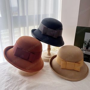 otoño invierno lana grace Flip brim bowknot Correas dama cubo gorra mujeres ocio sombrero