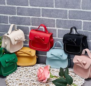 Bolso de bebé Bolso de hombro para niñas Versión coreana Moda mini arco personalidad Mochila para niños Carteras para niños Venta al por mayor de fábrica